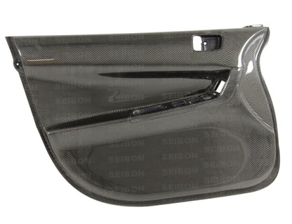 Seibon 08-12 Mitsubishi Evo Carbon Fiber Front Door Panels 0