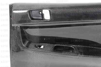 Seibon 08-12 Mitsubishi Evo Carbon Fiber Rear Door Panels 0