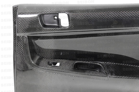 Seibon 08-12 Mitsubishi Evo Carbon Fiber Rear Door Panels 0