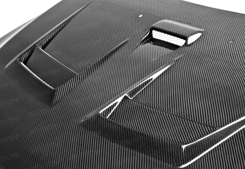 Seibon 08-12 Mitsubishi Lancer Evo X DV-Style Carbon Fiber Hood 1