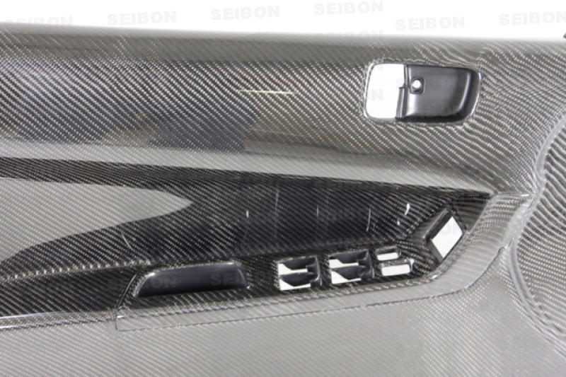 Seibon 08-12 Mitsubishi Evo Carbon Fiber Front Door Panels 1